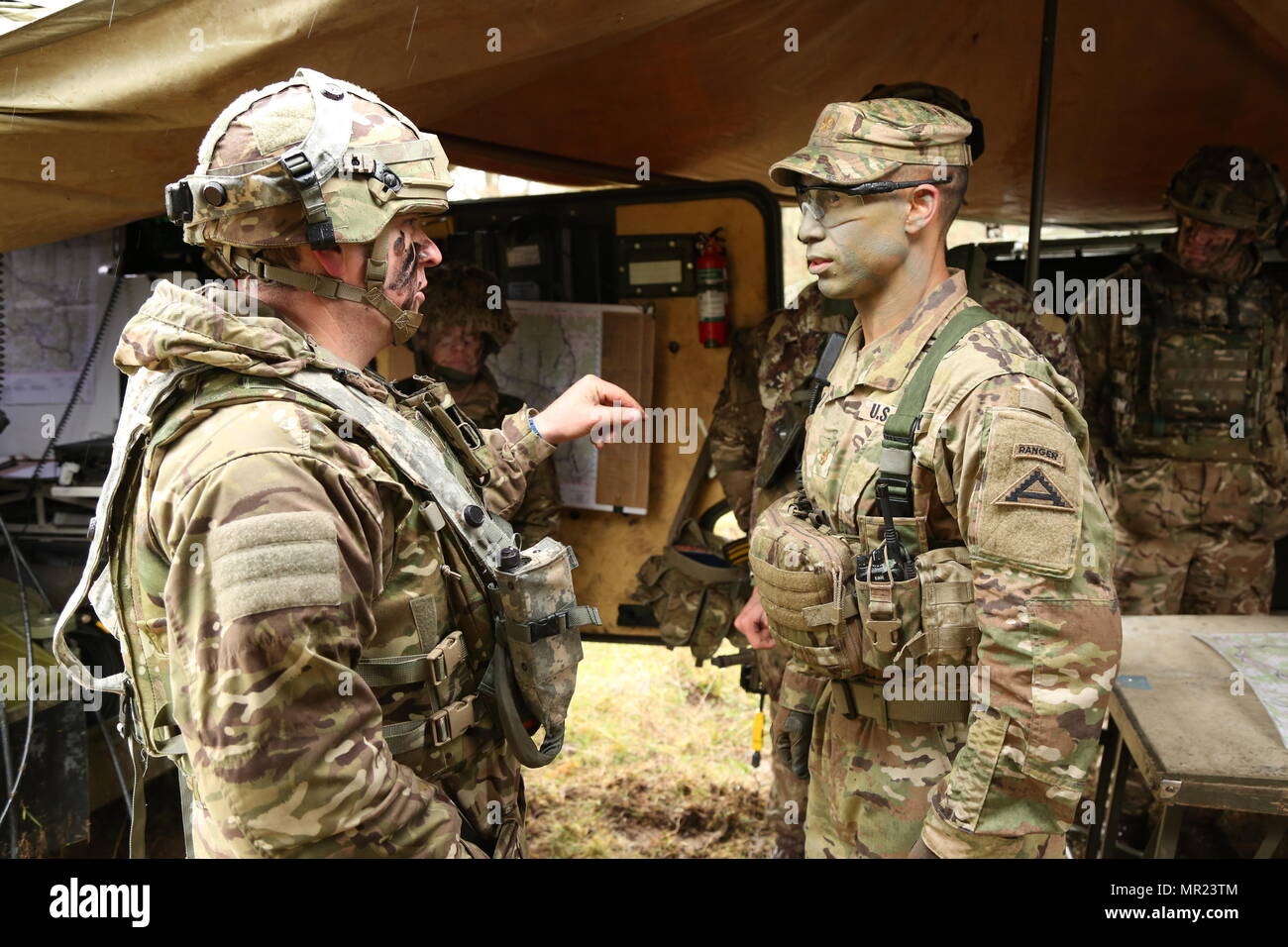 British Army Maj. Mick Burgess, left, of the Queens Royal Hussars ...