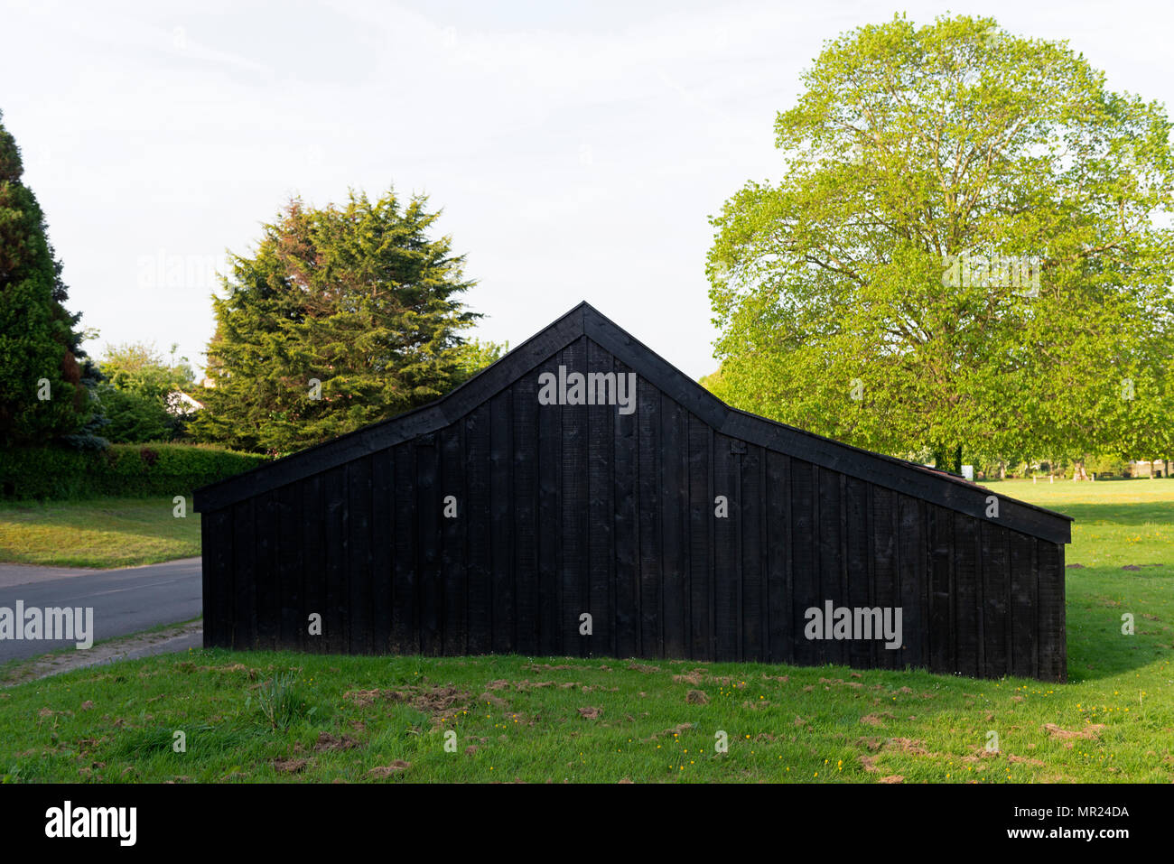 Wooden shed on village green, Westleton, suffolk, UK. Stock Photo