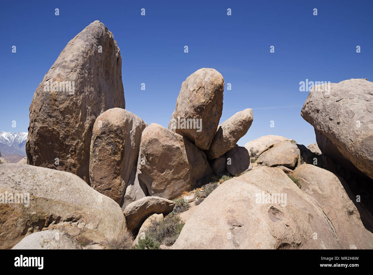 naturally stacked boulders at the Druid Stones near Bishop California Stock Photo