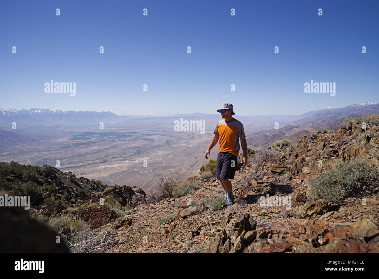 man on top of Black Mountain above the Owens Valley Stock Photo
