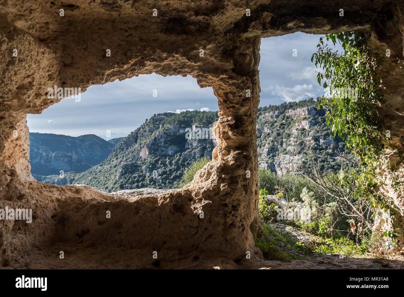 Interior of a tomb in Pantalica, a necropolis in Sicily Stock Photo