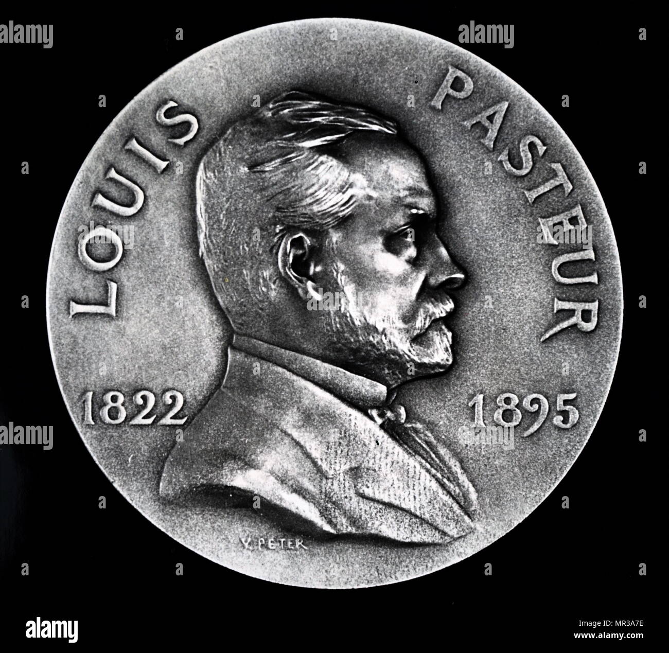 Commemorative medal depicting Louis Pasteur (1822-1895) a French biologist, microbiologist and chemist renowned for his discoveries of the principles of vaccination, microbial fermentation and pasteurisation. Dated 19th century Stock Photo