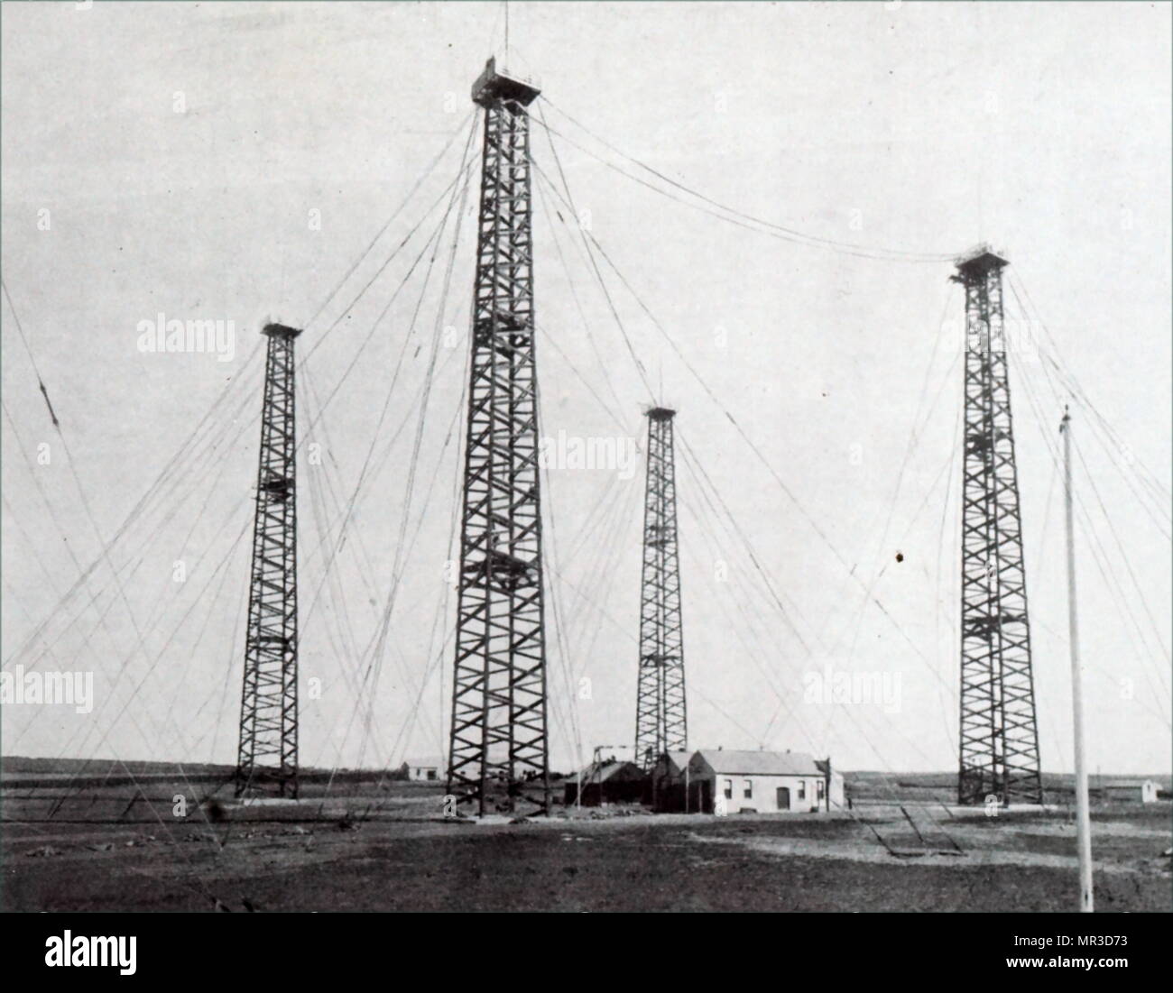 Photograph of Guglielmo Marconi's wireless telegraph station in Cornwall, which sent and received signals between England and America. The first successful transmission was 12 December 1901 between Poldhu and Hospital Point, Newfoundland. The towers were made from wood. Guglielmo Marconi (1874-1937) an Italian inventor and electrical engineer. Dated 20th century Stock Photo