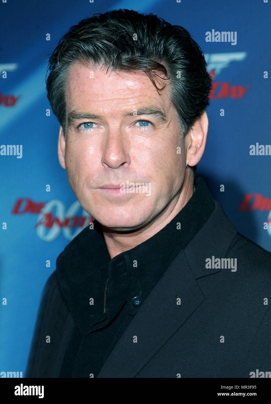 Pierce Brosnan arriving at the premiere of 'Die Another Day' at the Shrine Auditorium in Los Angeles. November 11, 2002. BrosnanPierce109 Red Carpet Event, Vertical, USA, Film Industry, Celebrities,  Photography, Bestof, Arts Culture and Entertainment, Topix Celebrities fashion /  Vertical, Best of, Event in Hollywood Life - California,  Red Carpet and backstage, USA, Film Industry, Celebrities,  movie celebrities, TV celebrities, Music celebrities, Photography, Bestof, Arts Culture and Entertainment,  Topix, headshot, vertical, one person,, from the year , 2002, inquiry tsuni@Gamma-USA.com Stock Photo