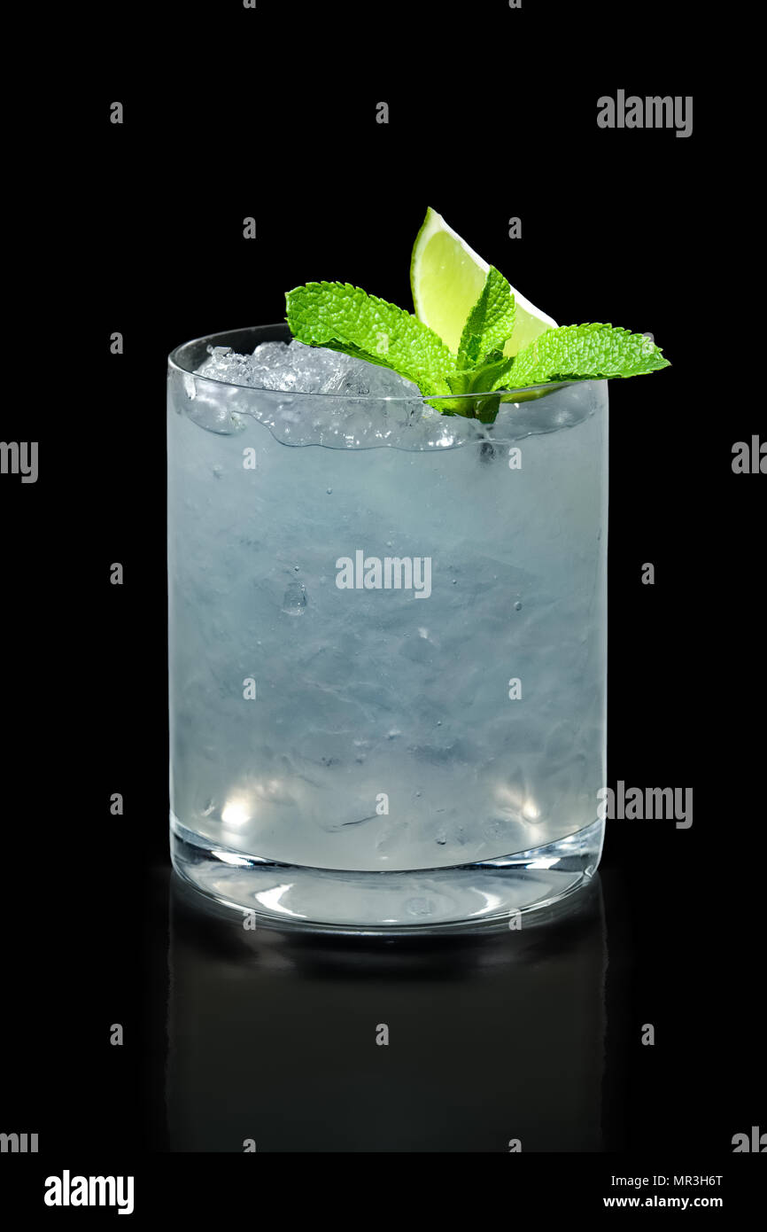 Rum cocktail with ice isolated on black Stock Photo Alamy