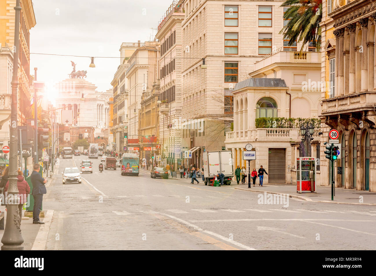 Rome, Italy, March 2017: view of Via Nazionale in Rome with the monument of the Fatherland in the background at sunset Stock Photo