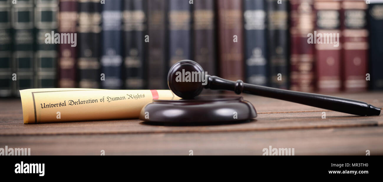 Law and Justice, Judge Gavel, Universal declaration of human rights on a wooden background, human rights concept. Stock Photo