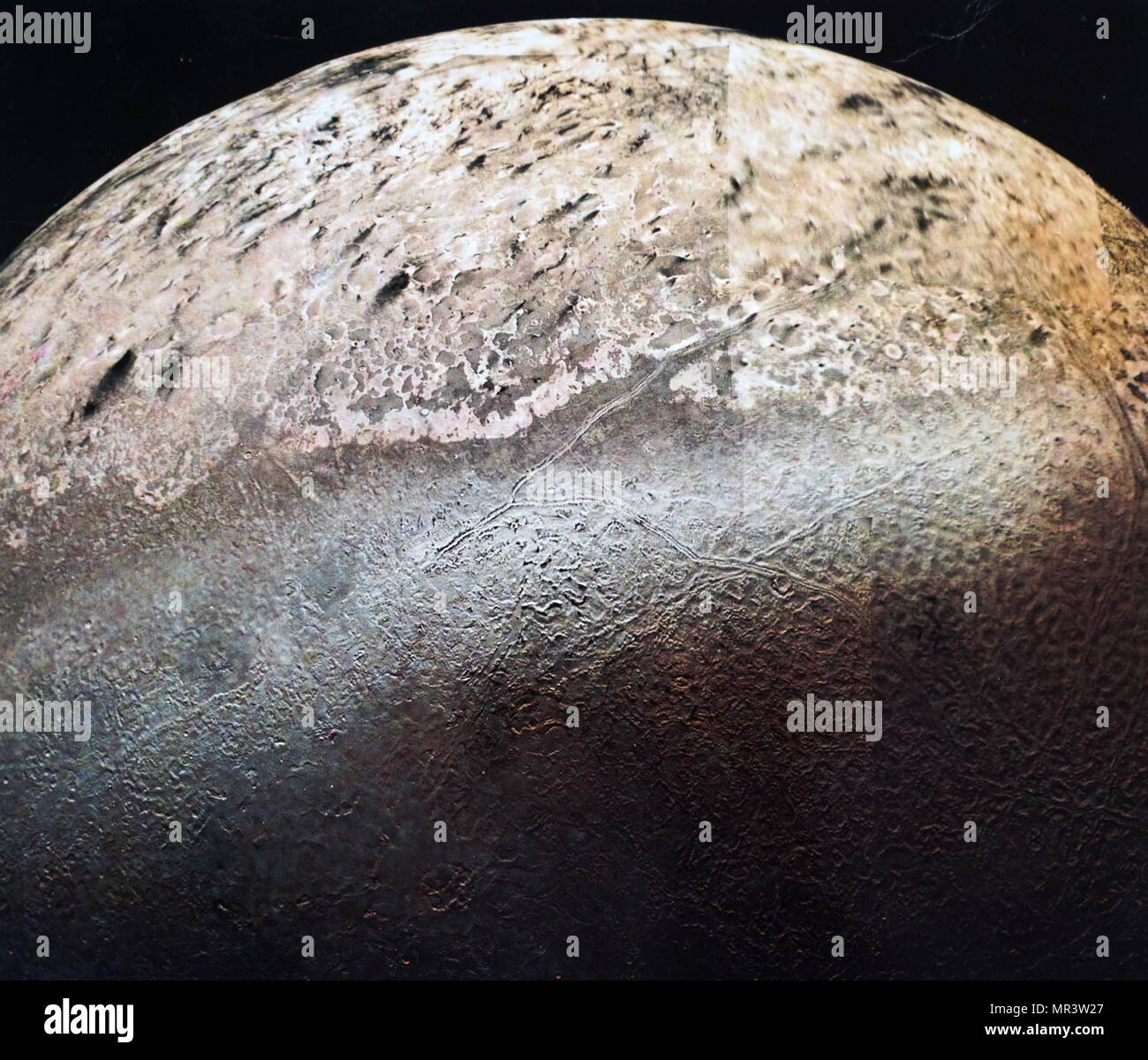 Colour photograph of Neptune's largest moon, Triton. Nearly two dozen images were combined to produce this comprehensive view of the Neptune facing hemisphere of Triton. Dated 20th century Stock Photo