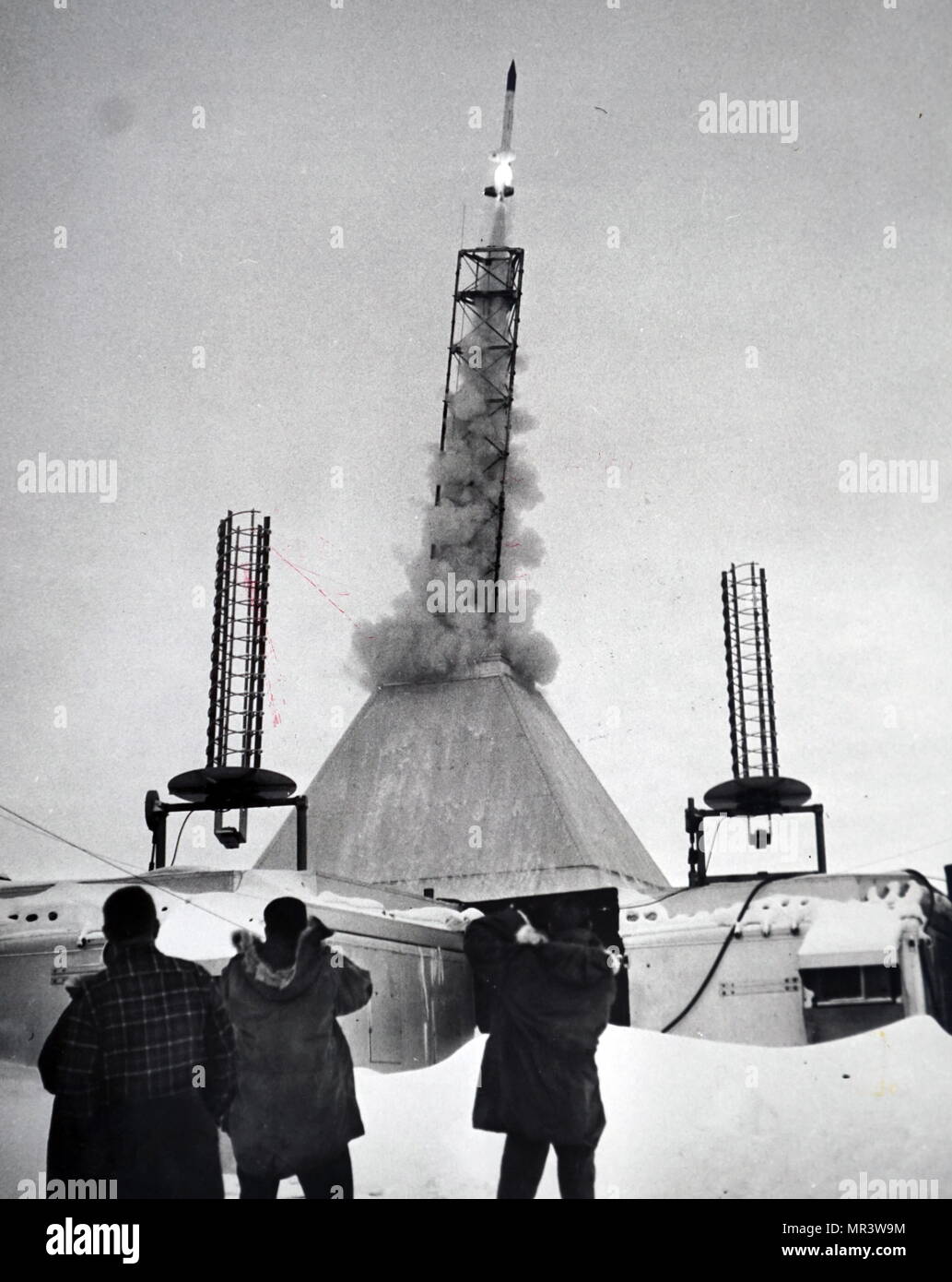 Photograph taken during the launch of the Aerobee rocket, a small unguided suborbital sounding rocket used for high atmospheric and cosmic radiation research in the United States. Dated 20th century Stock Photo