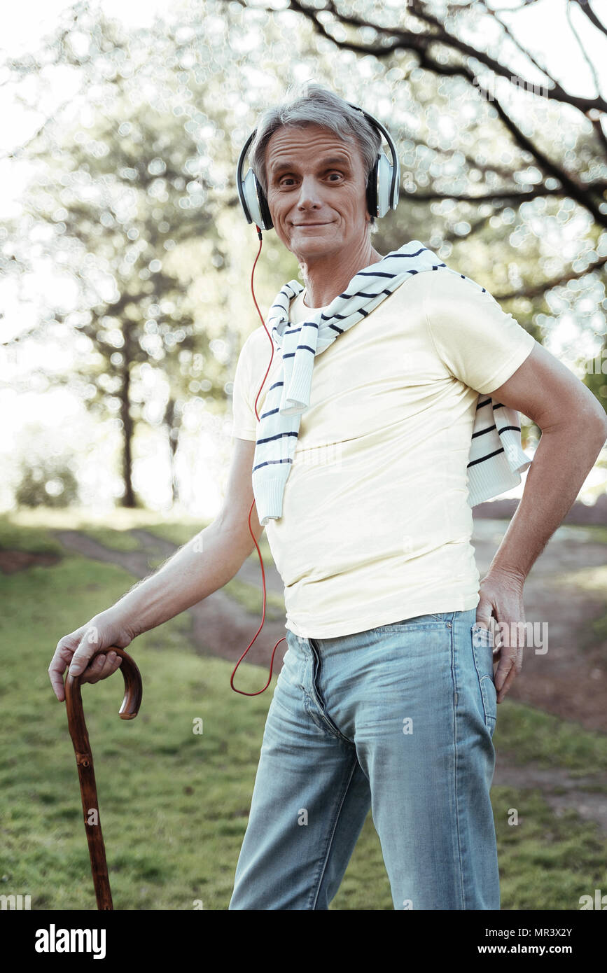 Joyful man posing on camera Stock Photo