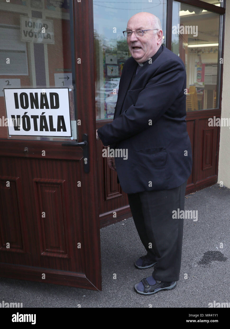 Father Tom Harrington arrives at the polling station in Knock National  school, Mayo, as the country goes to the polls to vote in the referendum on  the 8th Amendment of the Irish