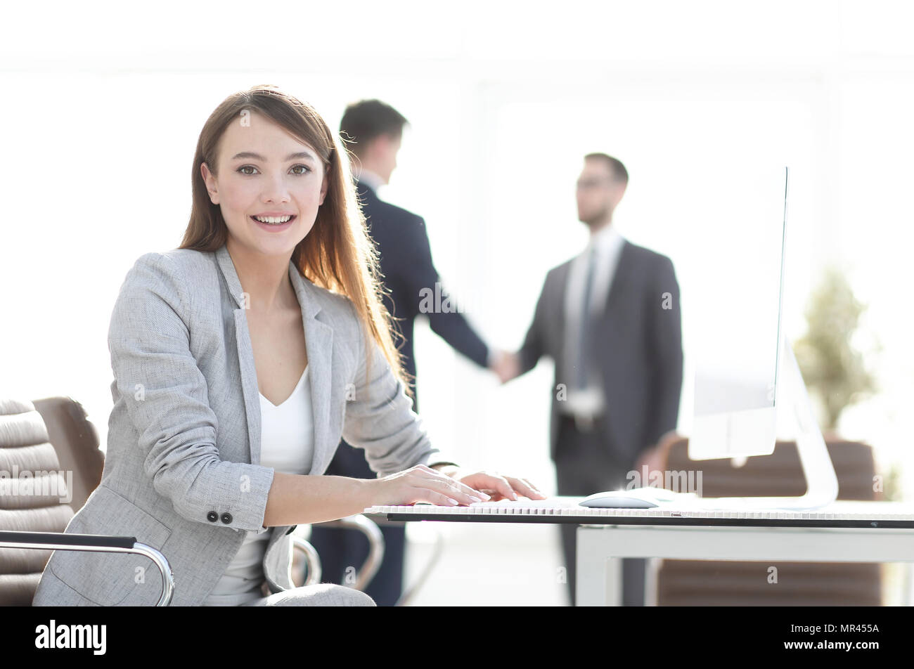 successful business woman on the background of the office Stock Photo ...