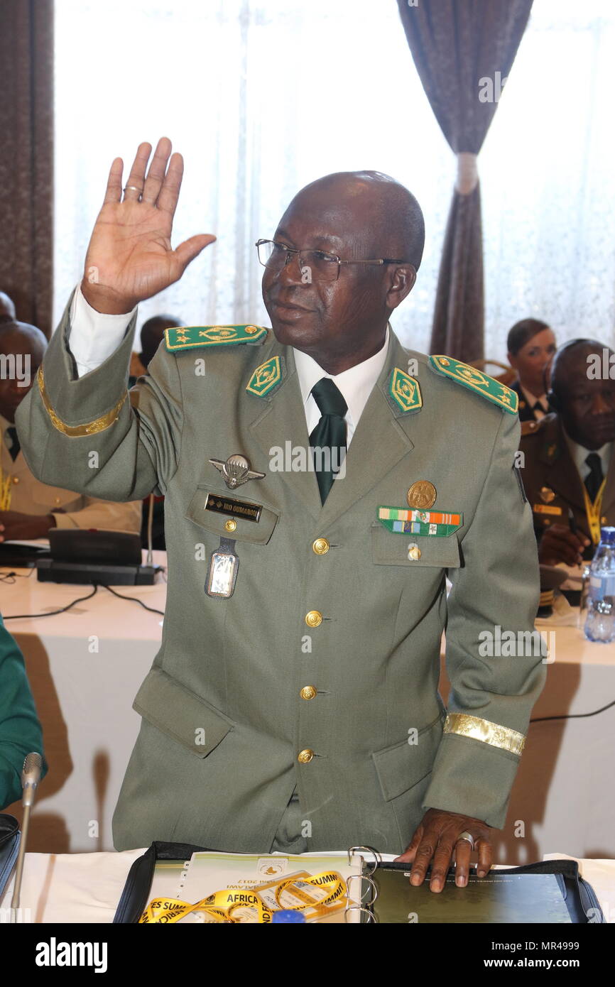 Brig. Gen. Iro Oumarou, Niger army chief of staff, stands for his