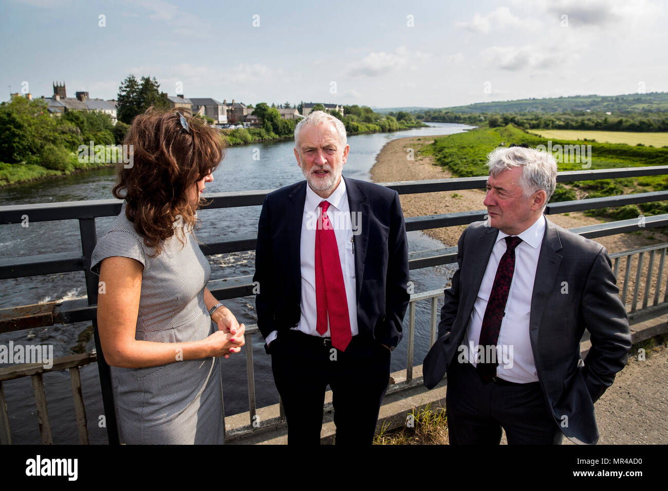 Labour leader Jeremy Corbyn with Professor Deirdre Heenan (left) and Shadow Secretary of State for Northern Ireland Tony Lloyd (right) during a visit to Lifford Bridge on the Irish border, while the country goes to the polls to vote in the referendum on the 8th Amendment of the Irish Constitution. Stock Photo