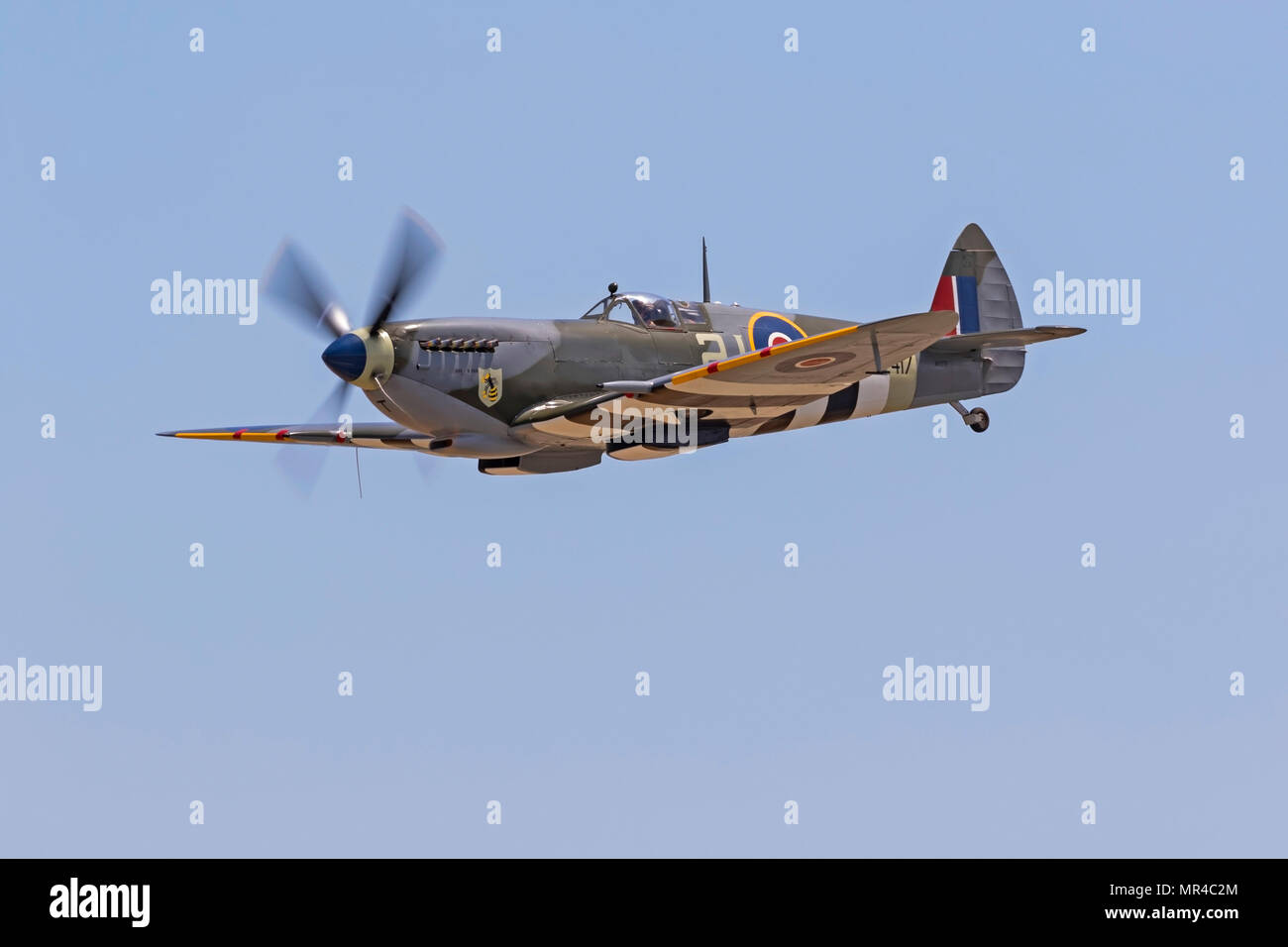 Airplane WWII Spitfire flying at airshow Stock Photo