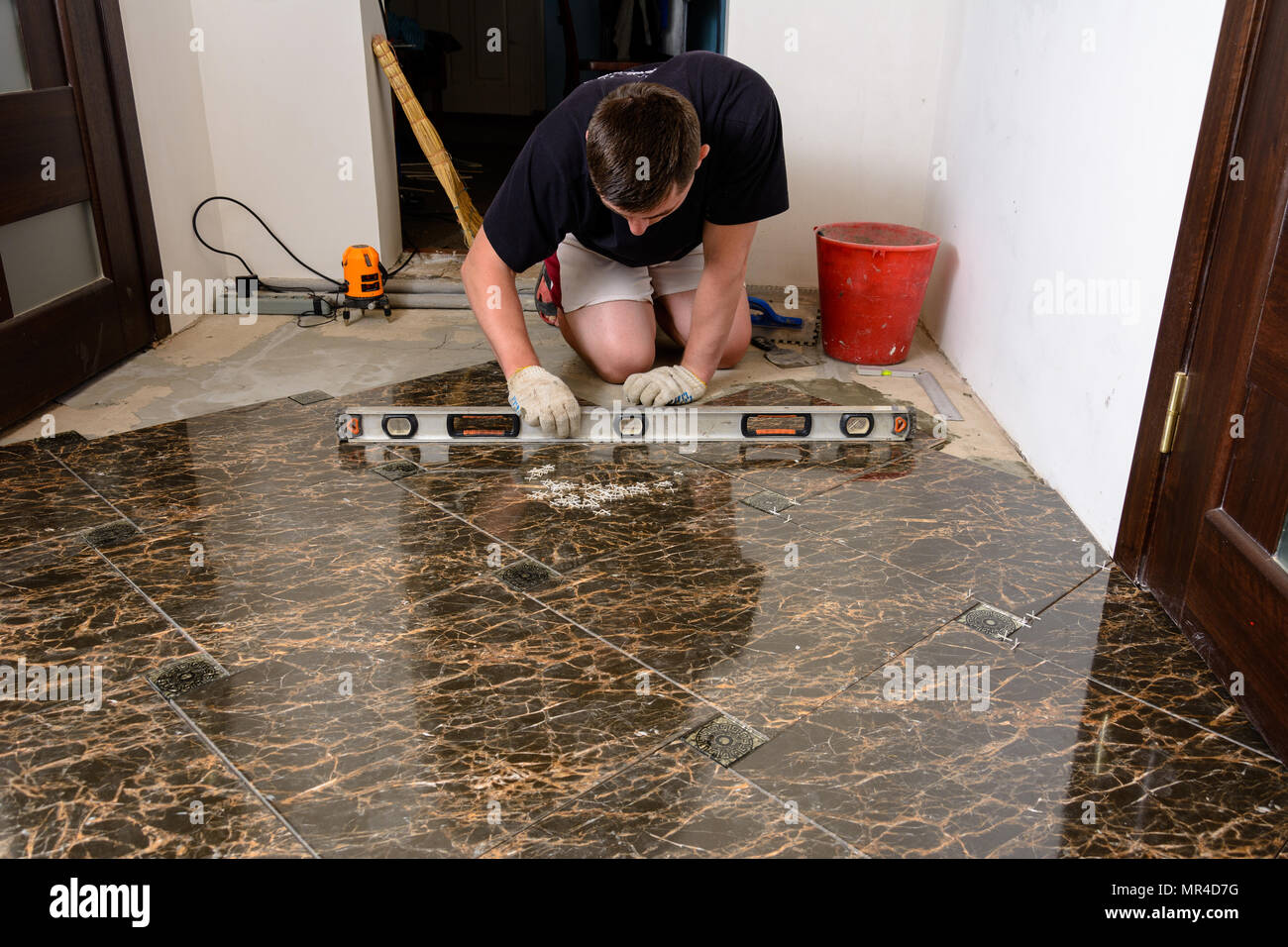 Tile Level Checking Integral tiles hi-res stock photography and images - Alamy