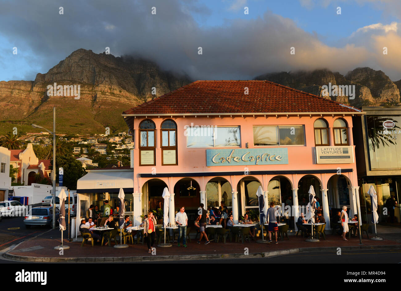 Cafes, Bars and restaurant along Victoria road in Camps Bay, Cape Town, South  Africa Stock Photo - Alamy