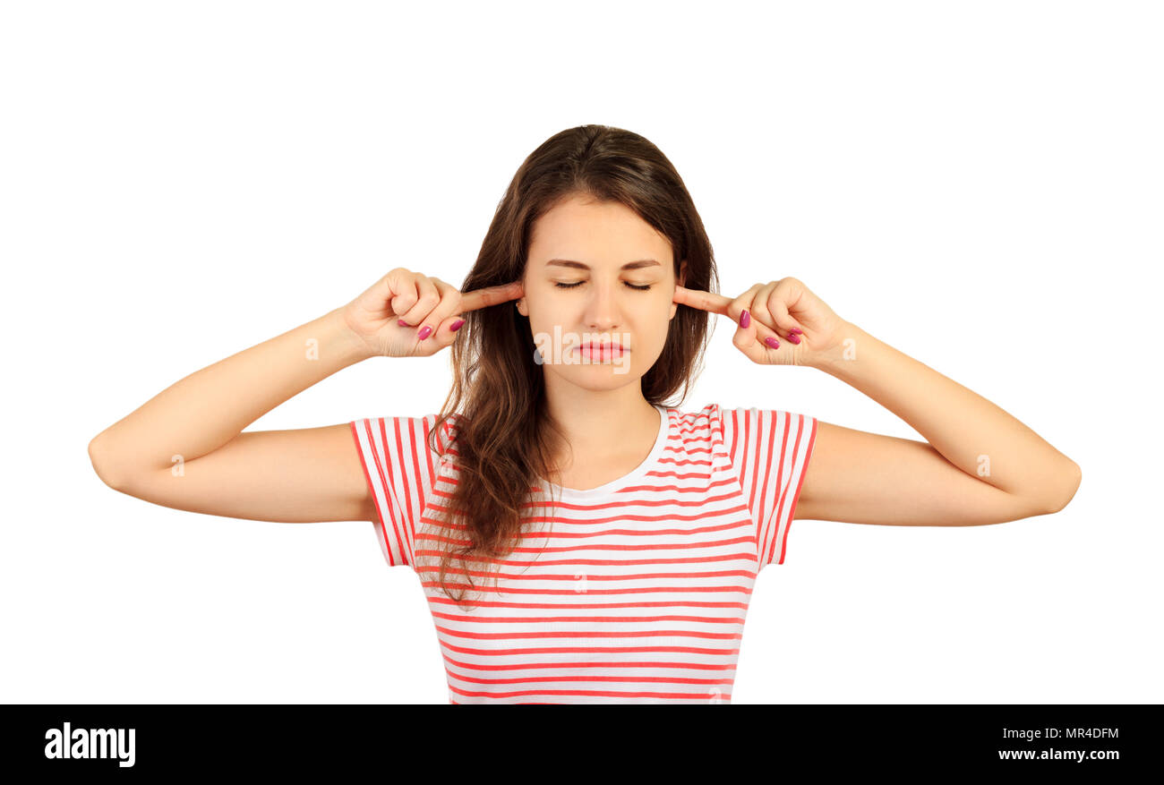 woman plugging ears with fingers and closing eyes tight, irritated with
