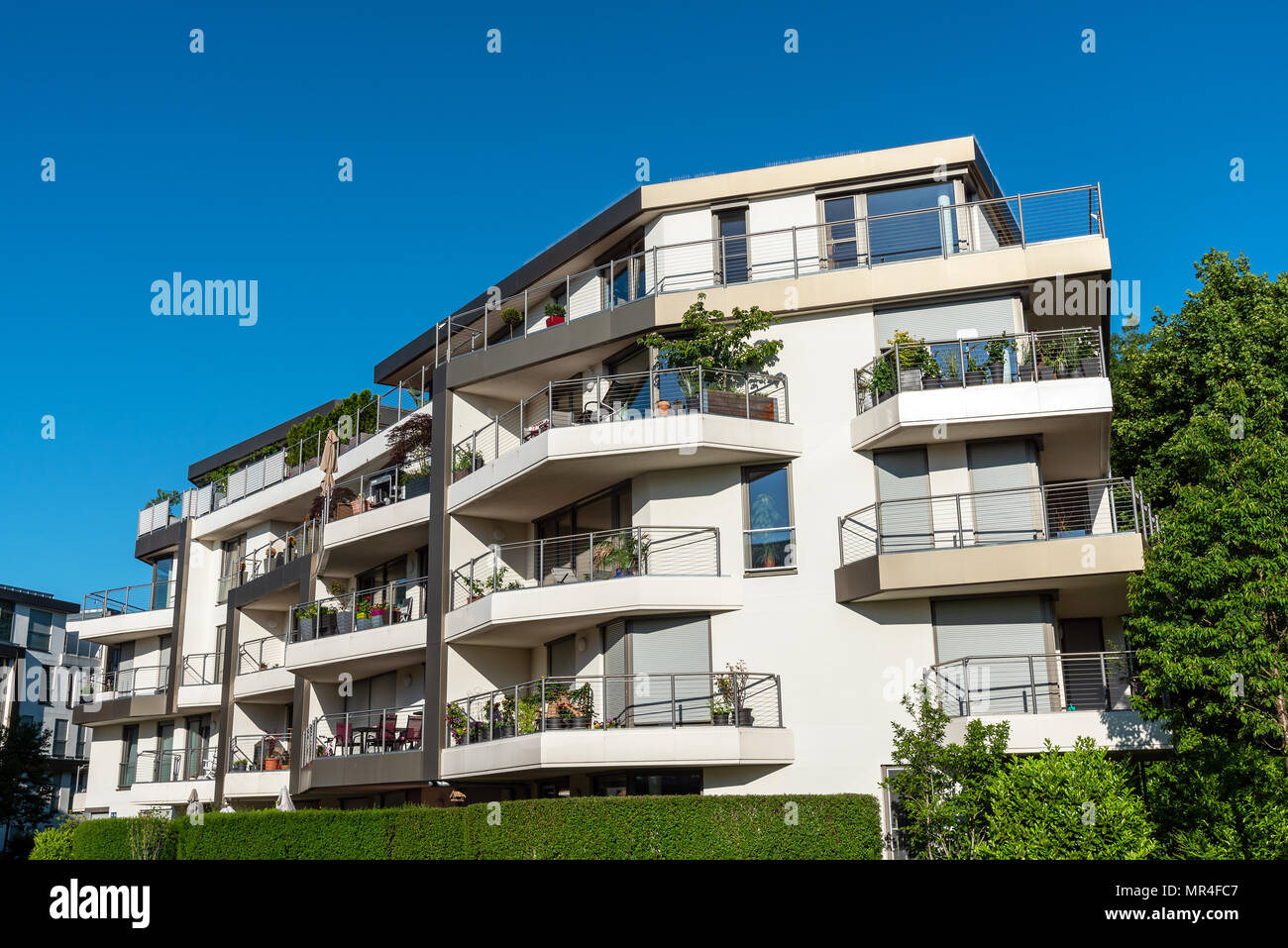 New apartment house on a sunny day in Munich, Germany Stock Photo Alamy
