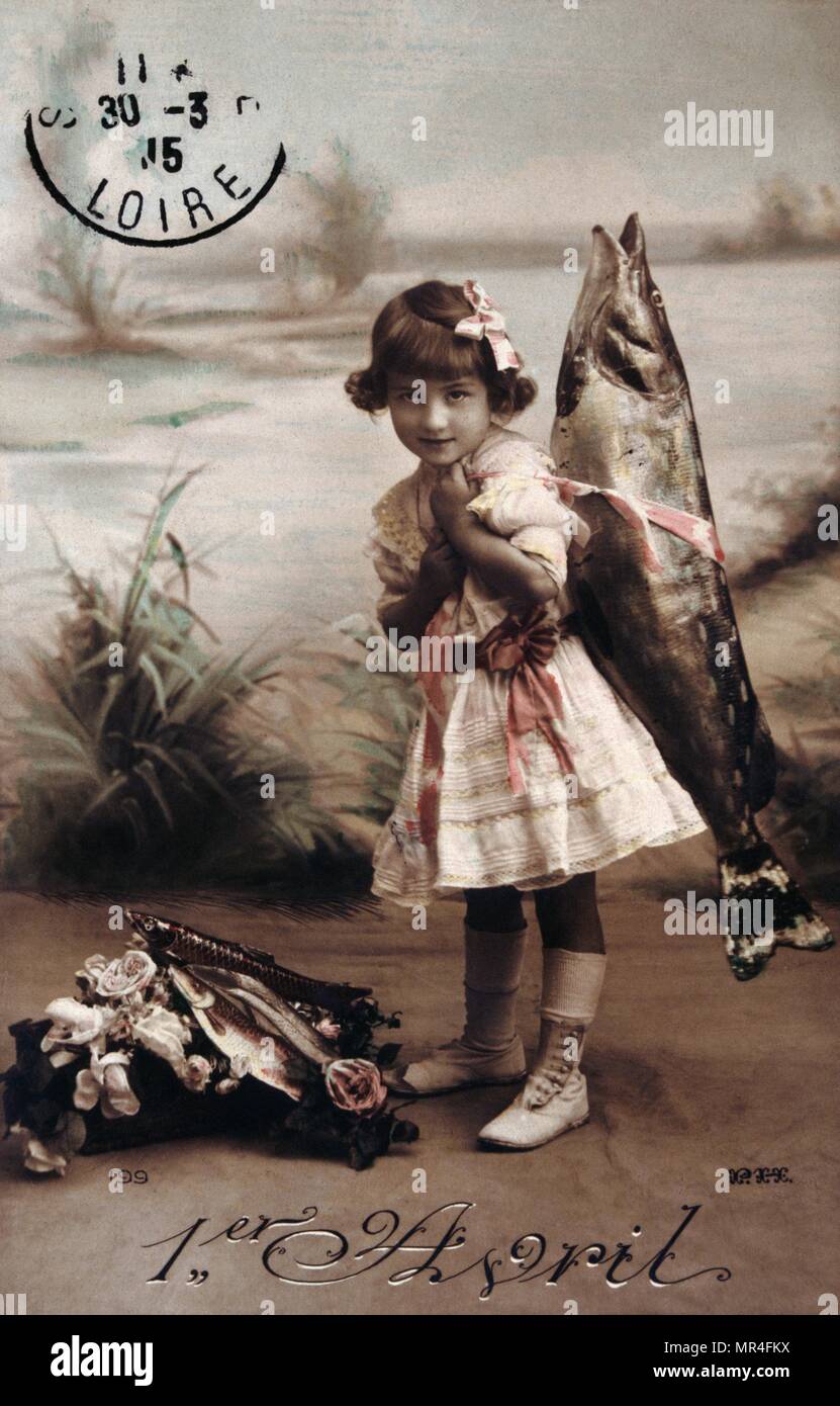 French postcard with image of a girl carrying a fish Stock Photo
