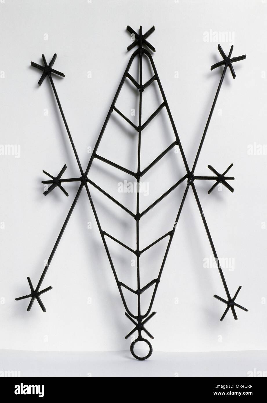 Haitian folk art: object made from wire inspired by a Voodoo design. Haiti. 1995 Stock Photo