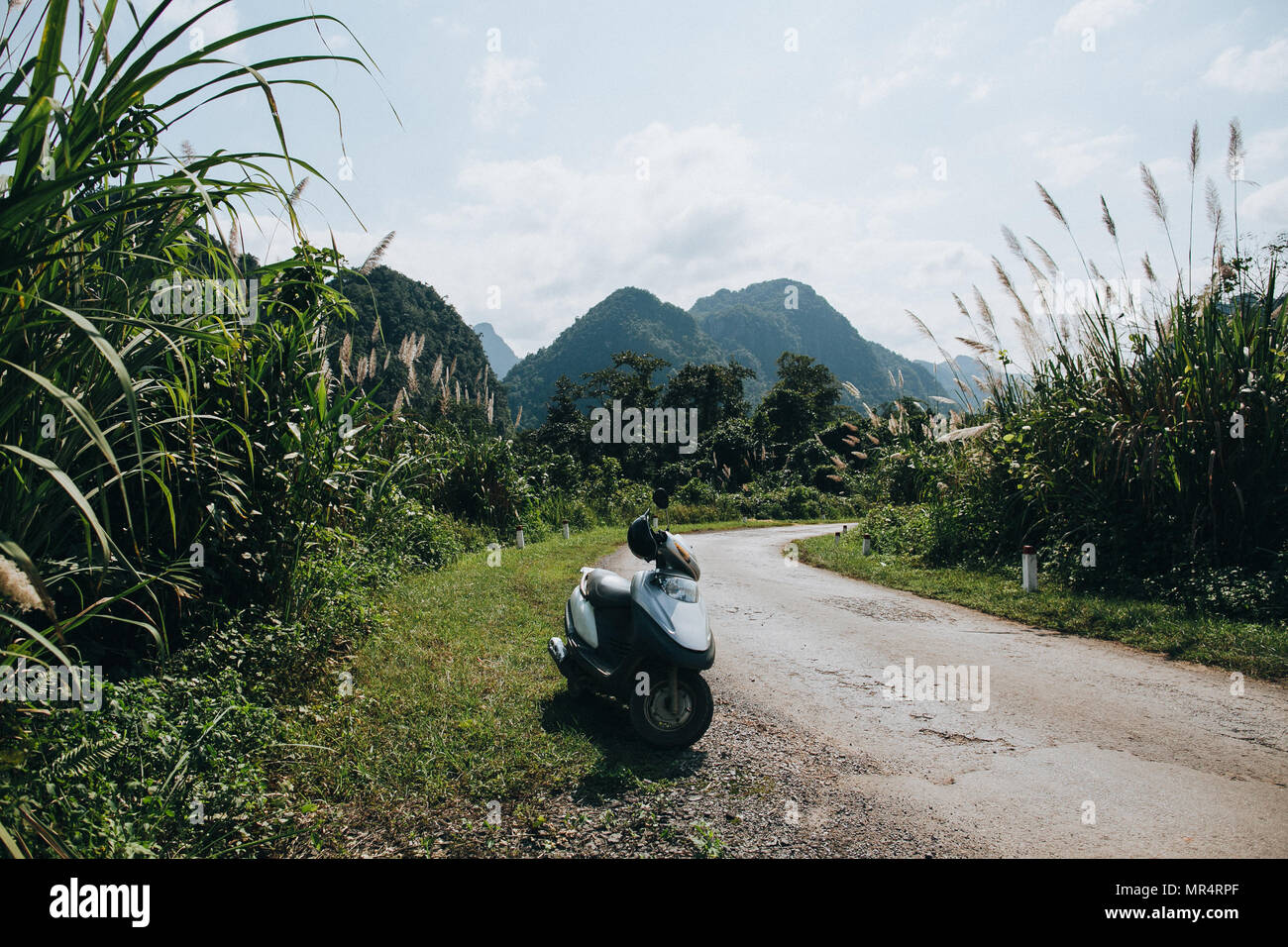 motorbike on rural road in Phong Nha Ke Bang National Park, Vietnam Stock Photo