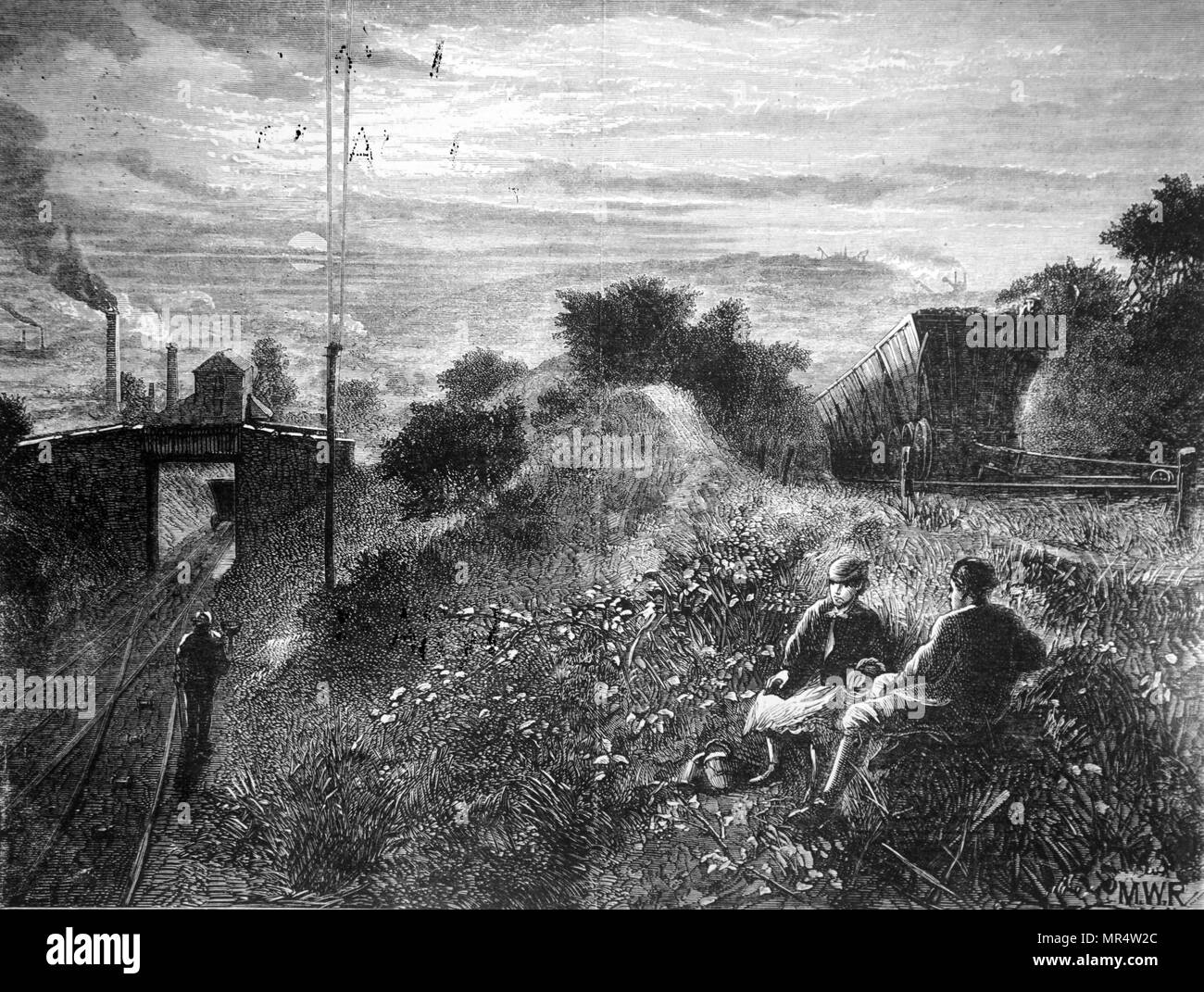Engraving showing the countryside scarred by mining- a typical scene in the Northumberland and Durham mining districts. On the right of the picture is the top of an inclined plane for transporting coal away from the pit head. The weight of the loaded wagons going down the incline hauled up the empty wagons to the top of the incline on a parallel track. Dated 19th century Stock Photo
