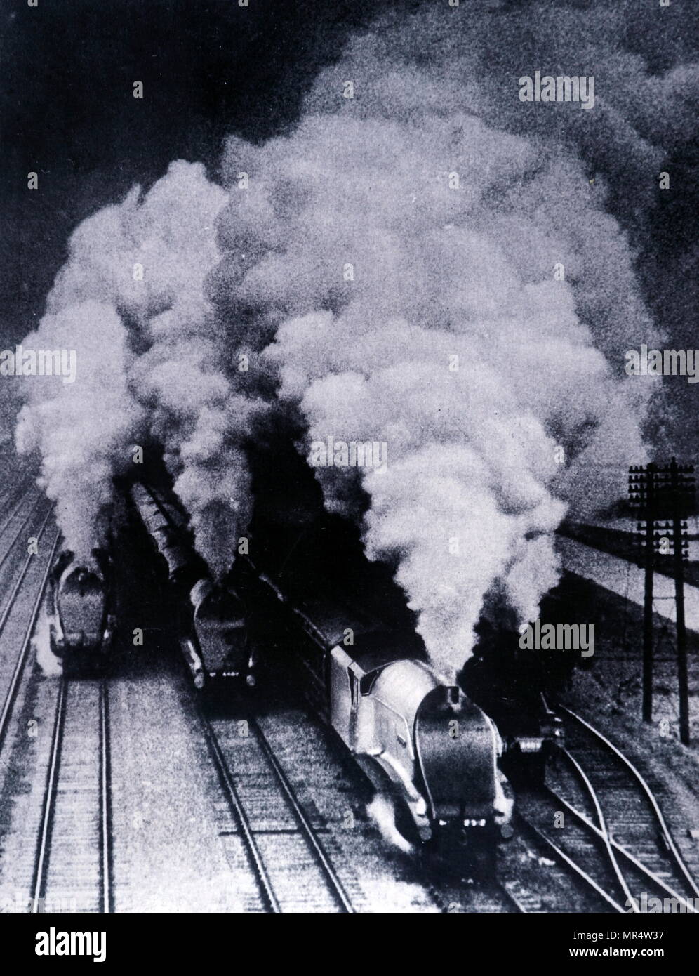 Photograph of three 'streamlined' locomotives. Dated 20th century Stock Photo