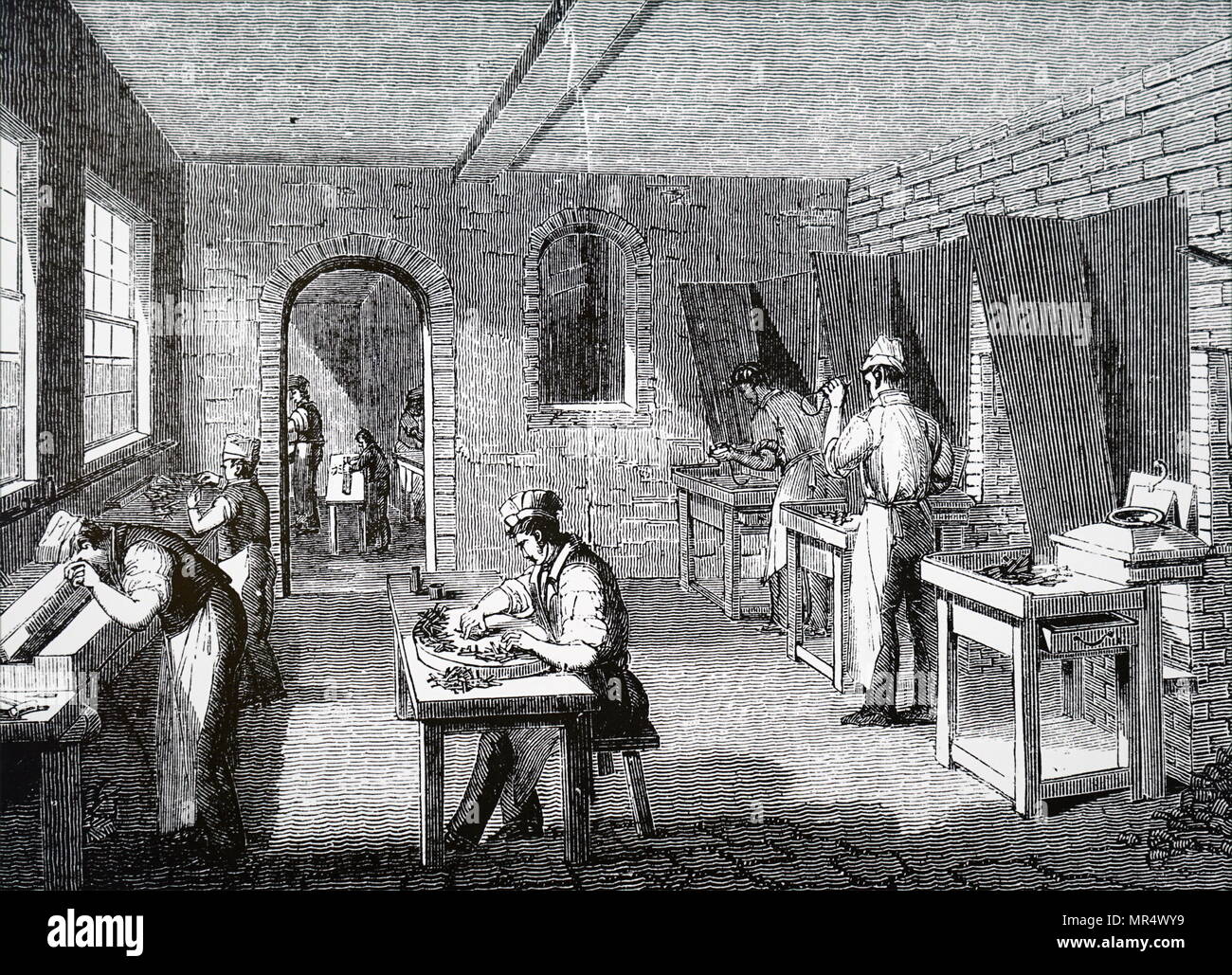 Illustration depicting a type-founder's shop in London. Dated 19th century Stock Photo