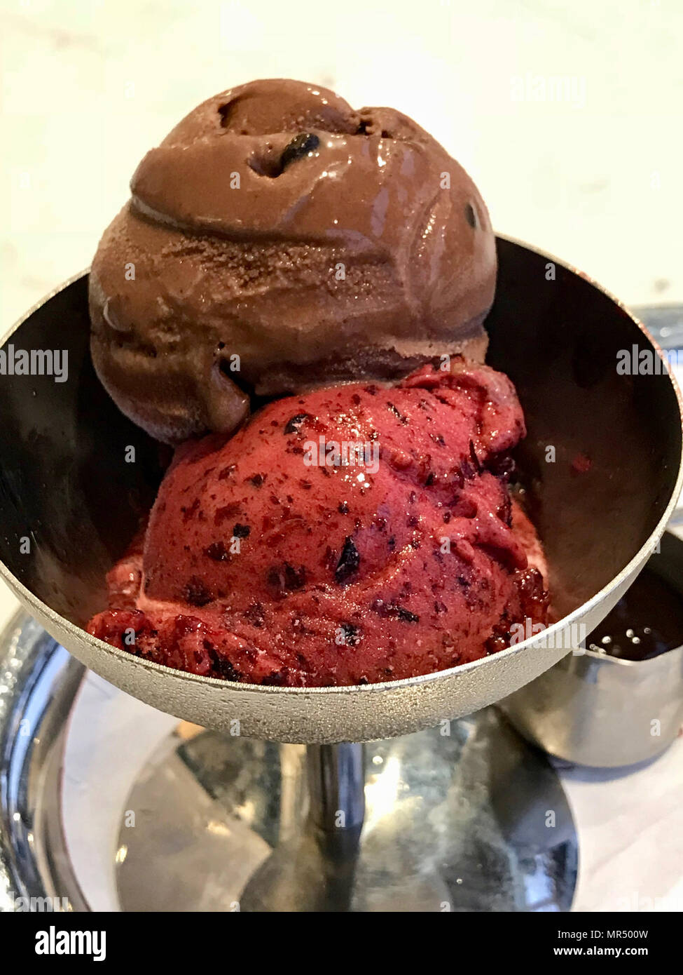 Chocolate and Cherry Ice Cream in Vintage Metal Bowl with Silver Tray. Organic Summer Dessert. Stock Photo