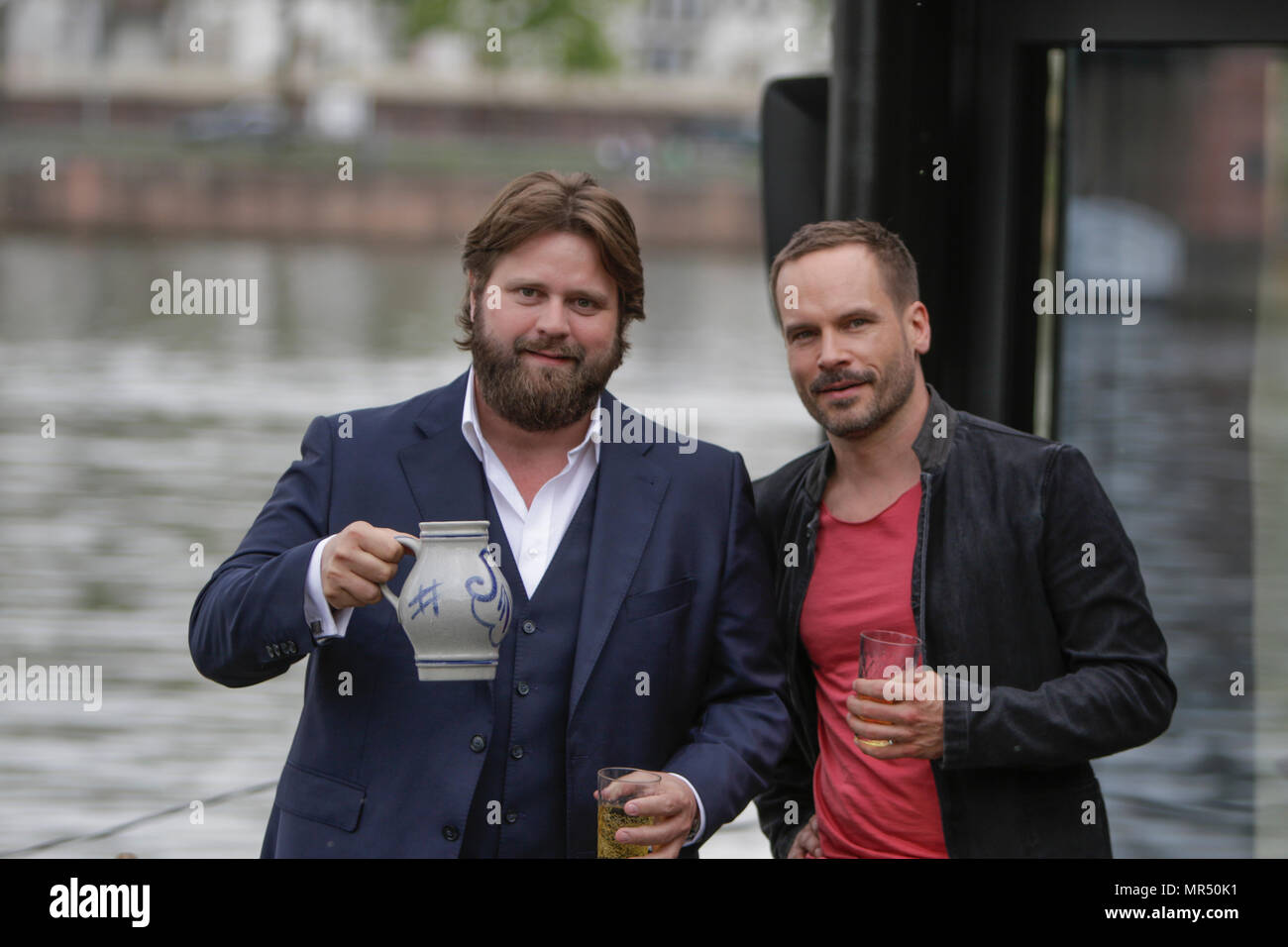 Actors Antoine Monot Jr Left And Wanja Mues Right Pose On The Terrace Of The Houseboat