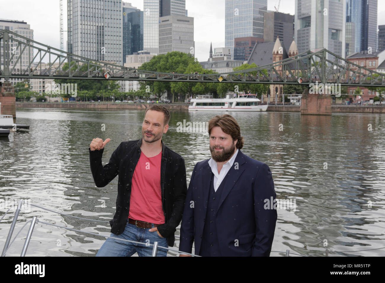 Actors Wanja Mues (left) and Antoine Monot, Jr. (right) pose on the gangway of the houseboat that is owned by Mues' character Leo in the TV show. 4 new episodes of the relaunch of the long running TV series 'Ein Fall fuer zwei’ (A case for two) are being filmed in Frankfurt for the German state TV broadcaster ZDF (Zweites Deutsches Fernsehen). It stars Antoine Monot, Jr. as defence attorney Benjamin ‘Benni’ Hornberg and Wanja Mues as private investigator Leo Oswald. The episodes are directed by Thomas Nennstiel. The episodes are set to air in October. (Photo by Michael Debets / Pacific Press) Stock Photo