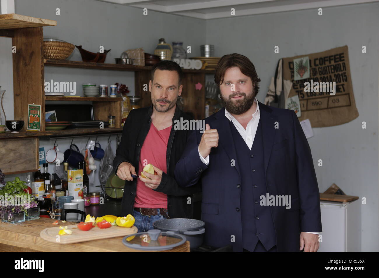 Actors Wanja Mues (left) an (Antoine Monot, Jr. (right) pose in the kitchen of  the houseboat that is owned by Mues' character Leo in the TV show preparing food. 4 new episodes of the relaunch of the long running TV series 'Ein Fall fuer zwei’ (A case for two) are being filmed in Frankfurt for the German state TV broadcaster ZDF (Zweites Deutsches Fernsehen). It stars Antoine Monot, Jr. as defence attorney Benjamin ‘Benni’ Hornberg and Wanja Mues as private investigator Leo Oswald. The episodes are directed by Thomas Nennstiel. The episodes are set to air in October. (Photo by Michael Debets / Stock Photo