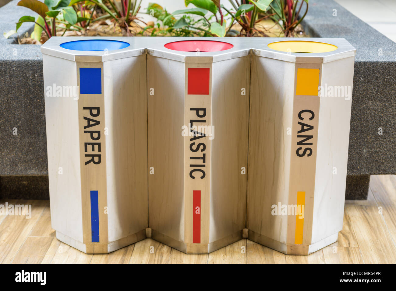 Three color trashs separates each type of garbage Stock Photo Alamy