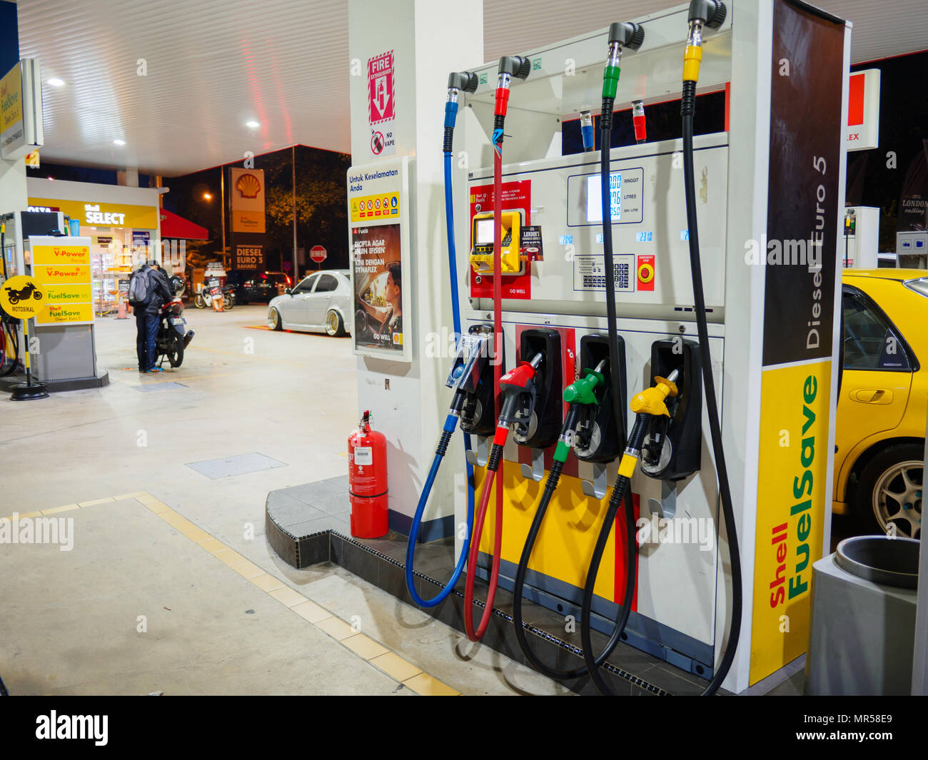 Kedah, Malaysia - June 9, 2017: Shell gas station blue sky background. Royal Dutch Shell sold its Australian Shell retail operations to Dutch company  Stock Photo