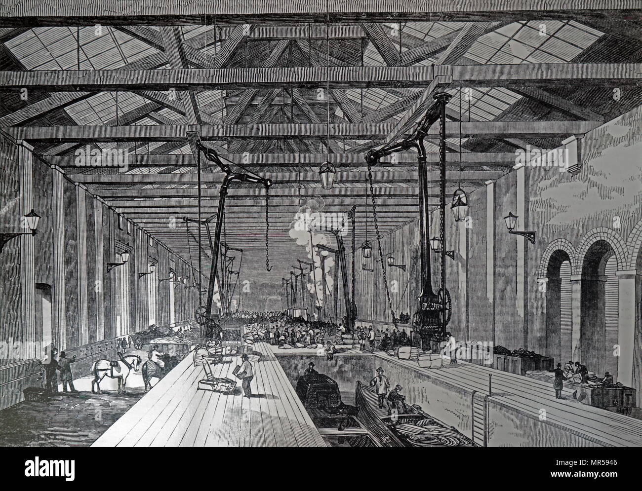 Engraving depicting the Great Northern Railway goods shed at the London terminus, designed by Lewis Cubitt. It connected the railway freight to the Thames at Limehouse by the way of the Regent's Canal. Lewis Cubitt (1799-1883) an English civil engineer. Dated 19th century Stock Photo