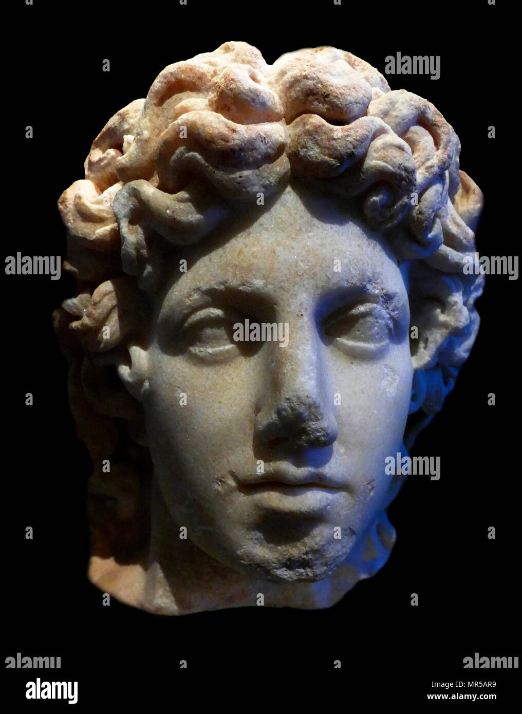 Photograph of a Classical Roman bust depicting the God Apollo. Dated 2nd Century Stock Photo