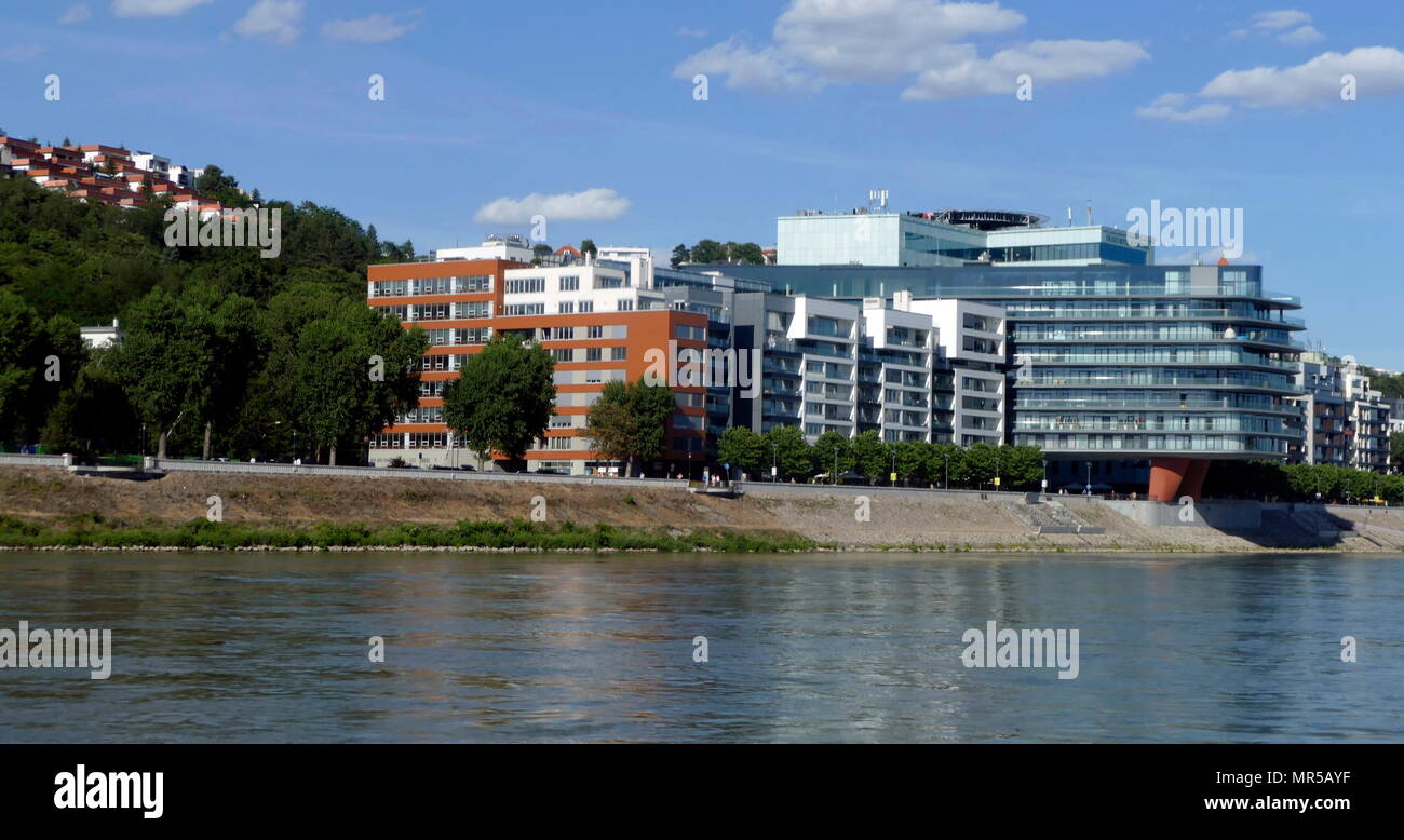 Photograph of taken of modern apartment buildings alongside the River