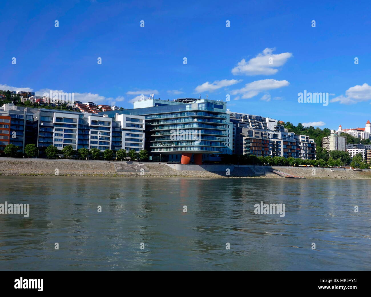Photograph of taken of modern apartment buildings alongside the River
