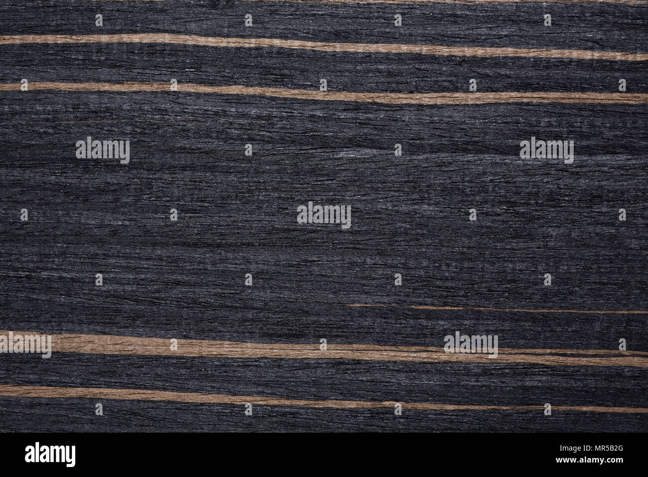 Extraordinary clear-cut veneer texture in dark tone. Stock Photo