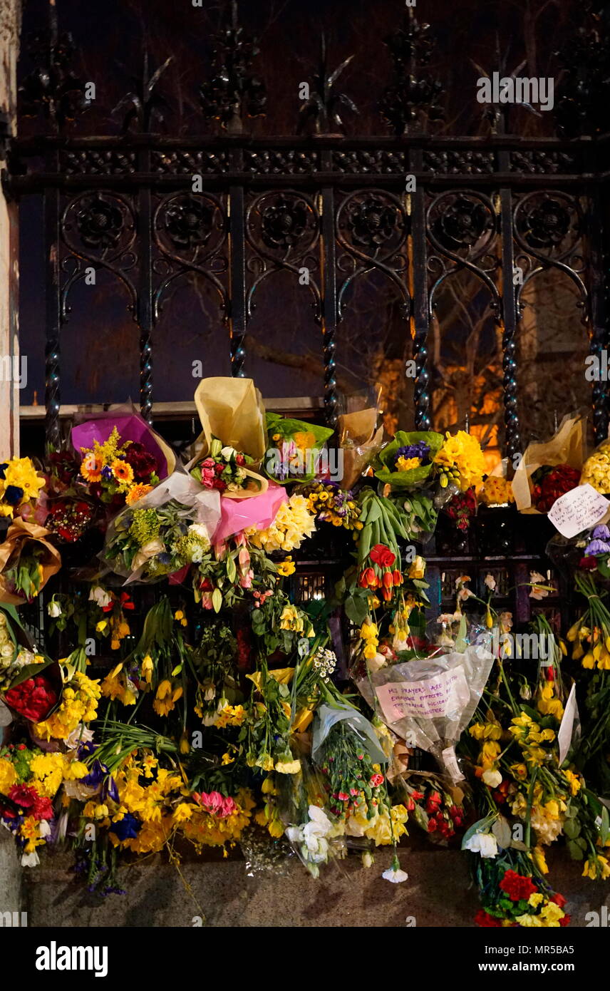 Photograph showing the tributes placed outside of Parliament in London, after the 22 March 2017, terrorist attack. The attacker, 52-year-old Briton Khalid Masood, drove a car into pedestrians on the pavement along the south side of Westminster Bridge and Bridge Street, injuring more than 50 people, four of them fatal. Dated 21st Century Stock Photo