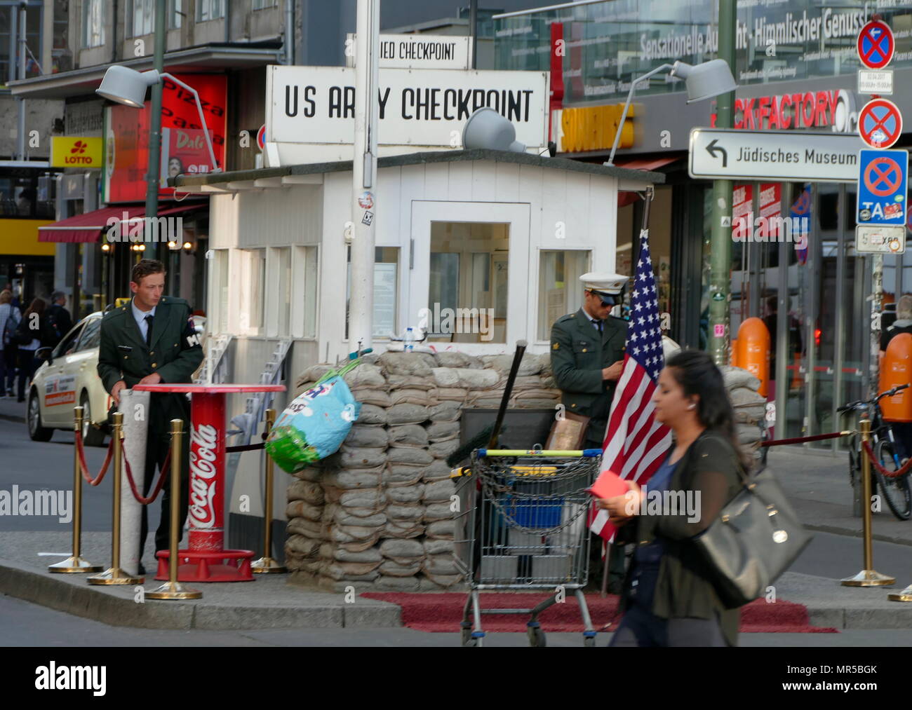 Photograph of Checkpoint Charlie (or "Checkpoint C") was the name given by the Western Allies to the best-known Berlin Wall crossing point between East Berlin and West Berlin during the Cold War (1947–1991). Stock Photo