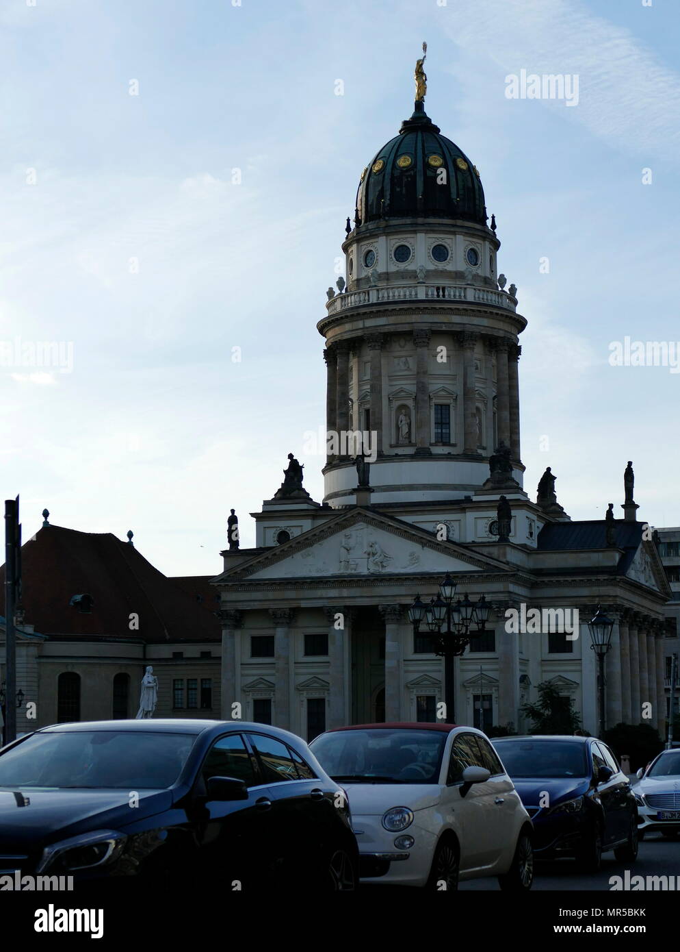 Franzosischer Dom (French Cathedral) located in Berlin on the Gendarmenmarkt, formerly a church of German-speaking congregants. Louis Cayart and Abraham Quesnay built the first parts of the French Church from 1701 to 1705 for the Huguenot (Calvinist) community. Stock Photo