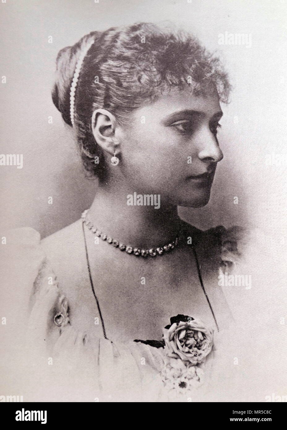 Photograph of Alexandra Feodorovna (1872 – 1918), Empress of Russia as the spouse of Nicholas II, the last ruler of the Russian Empire. Originally known as Alix of Hesse and by Rhine, she was a granddaughter of Queen Victoria of the United Kingdom. Dated 19th Century Stock Photo