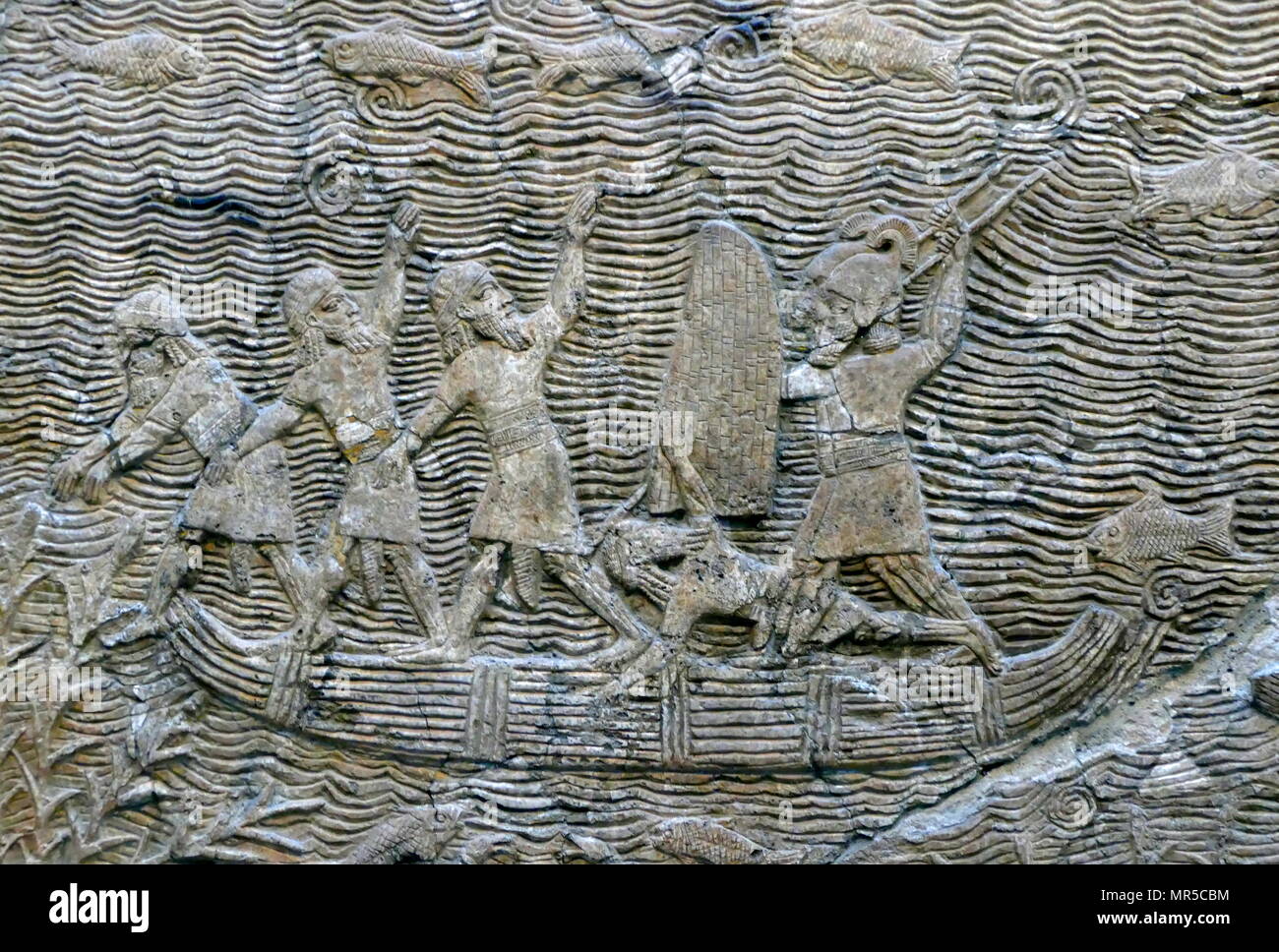 Ancient Assyrian soldiers on reed boat, in the marshes of southern Iraq. Assyrian, about 640-620 ВС From Nineveh, South-West Palace. Stock Photo