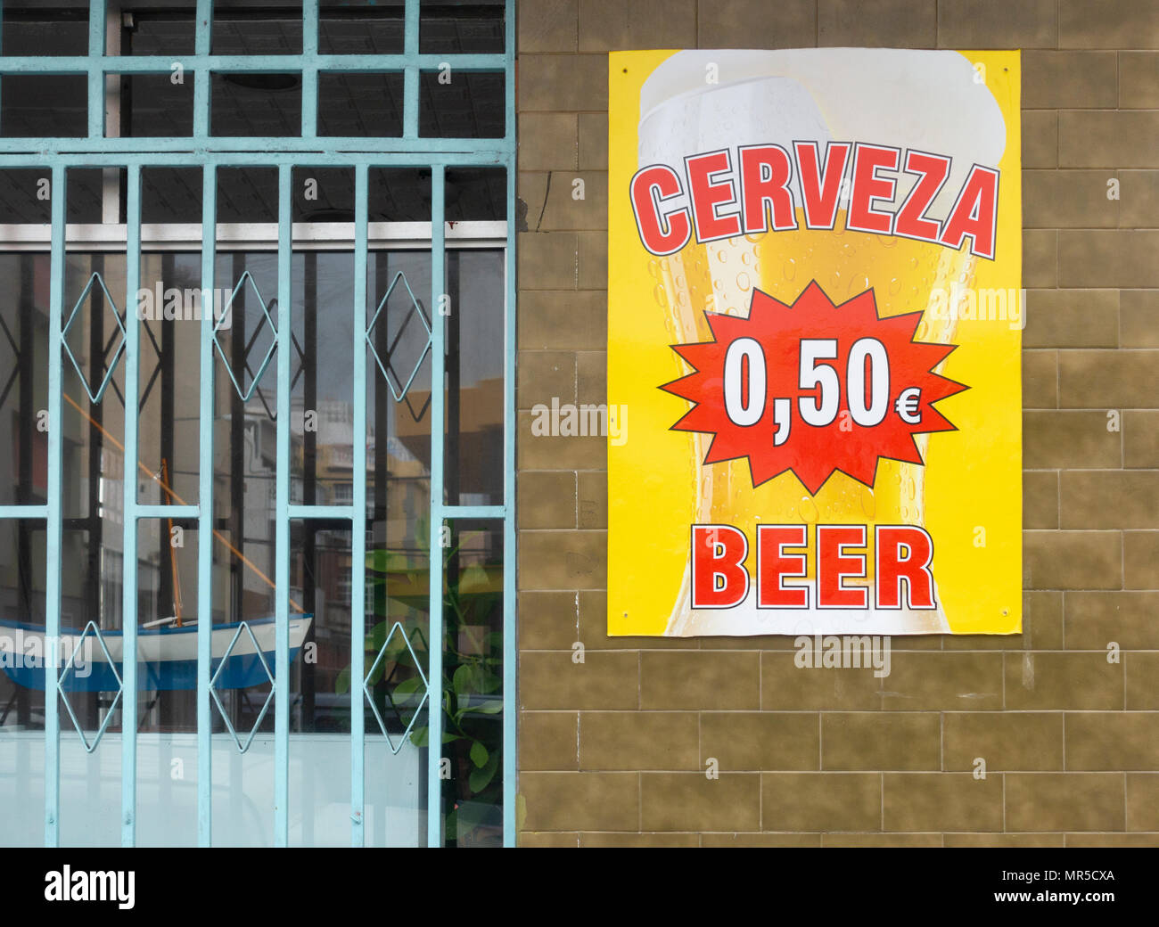 Cheap Cerveza (Beer) sign outside bar in Spain. Stock Photo