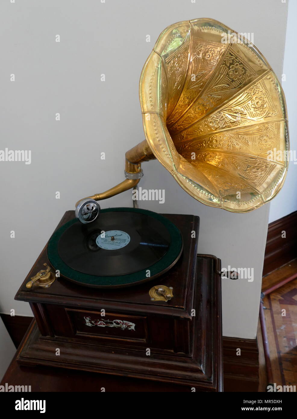 A Victor V phonograph, circa 1907. The phonograph was a device, invented in 1877, for the mechanical recording and reproduction of sound. In its later forms, it was also called a gramophone (as a trademark since 1887, as a generic name in the UK since 1910), Stock Photo