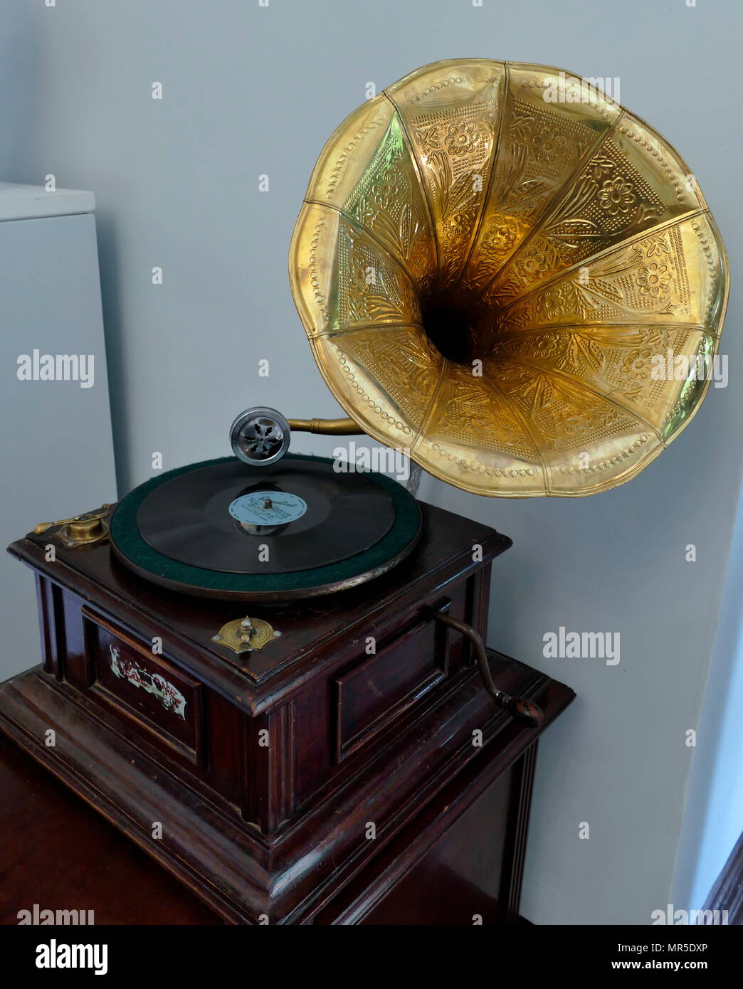 A Victor V phonograph, circa 1907. The phonograph was a device, invented in 1877, for the mechanical recording and reproduction of sound. In its later forms, it was also called a gramophone (as a trademark since 1887, as a generic name in the UK since 1910), Stock Photo