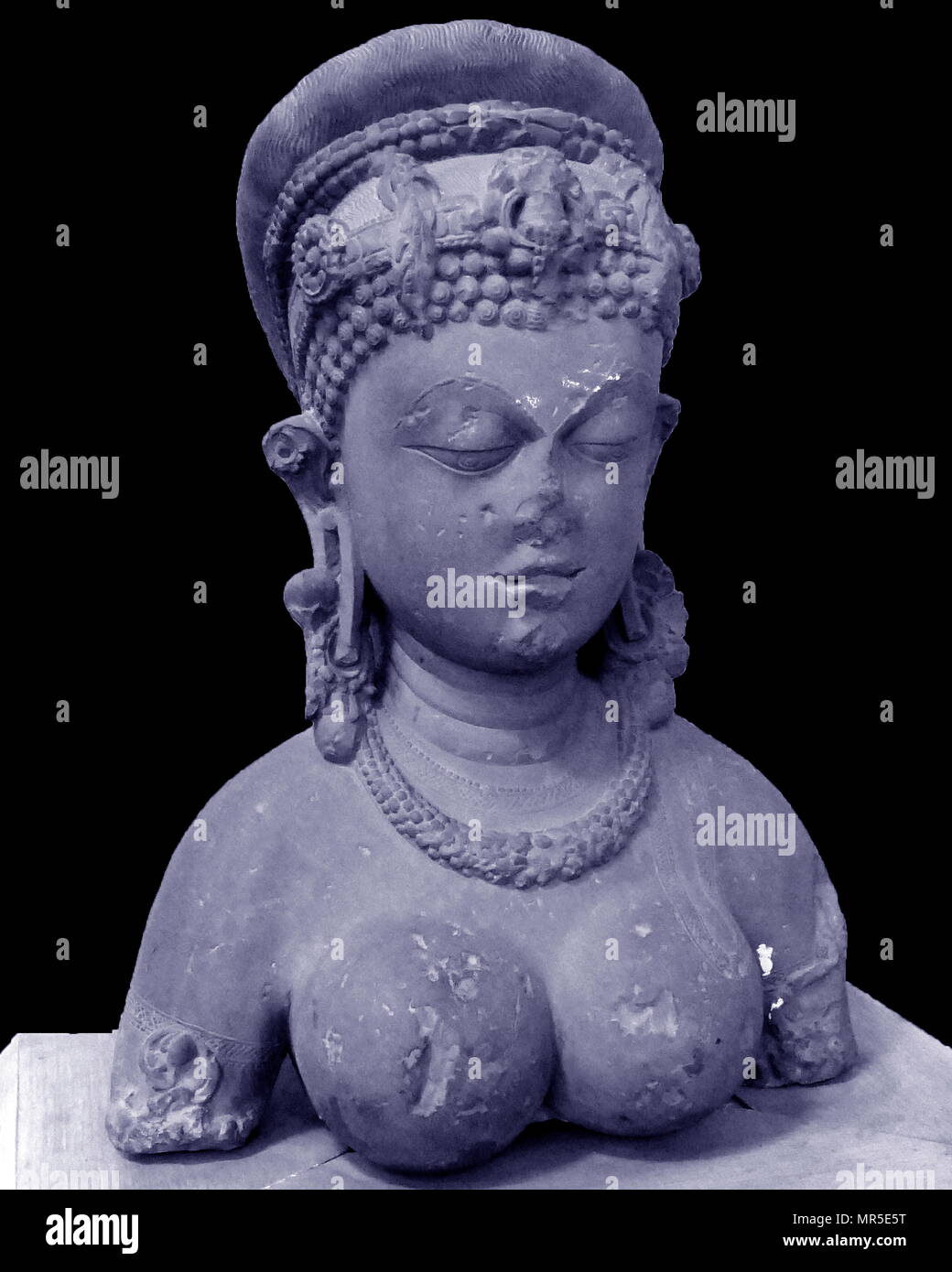 Bust of a female made of stone from Madhya Pradesh, India. Dated 9th Century Stock Photo