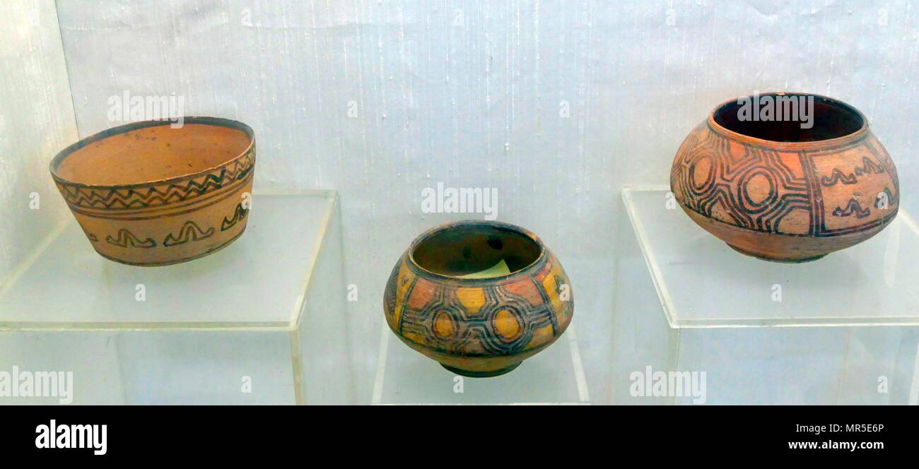 Collection of terracotta Harappa ceramics from the Indus Valley Civilisation at Mohenjo-Daro, Pakistan. The Indus Valley Civilisation was a Bronze Age culture, (3300–1300 BCE; mature period 2600–1900 BCE) mainly in the north-western regions of South Asia, extending from what today is northeast Afghanistan to Pakistan and northwest India Stock Photo